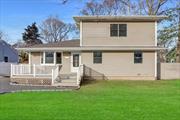 Amazing five bedroom, two-bathroom colonial finished basement . This home offers a modern open floor plan, wood deck, and large yard. Excellent location minutes from the Sunrise Highway, shopping, and Smith Point Park., Finished Basement with outside entrance with full bath.