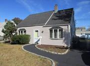 Welcome to this beautiful cape style whole house rental in a prime location of Levittown, NY. This charming property features a spacious living room with plenty of windows and wall AC unit, an eat-in-kitchen with an electric stove, microwave, refrigerator and outdoor access, 2 spacious bedrooms and a full bathroom with bathtub. The second floor features two additional bedrooms, closets, and washer and dryer. Gleaming hardwood flooring throughout. Plenty of natural sunlight! Updated 200 amps electric panel. The fenced in large backyard offers a beautiful outdoor patio area for entertainment and a shed for storage. Private driveway available for parking 2 to 3 cars. Excellent location, close to Route 106, Hempstead Turnpike, LIRR train station, neighborhood parks, 9 public swimming pools, shopping and restaurants. Must see this beauty before it&rsquo;s gone!