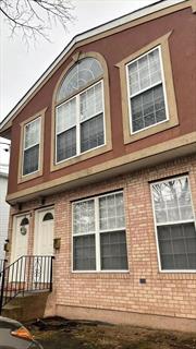 Newly renovated 1st floor of 2-family house. 3 Bedrooms, 2 full bathrooms. Large living/dining area, eat-in kitchen, full finished basement with laundry room. Sole use of yard and 2 parking spots for cars.