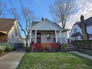 Welcome to Ilion avenue; a quaint neighborhood street. As you pull up to the home you are immediately greeted with a large covered front porch. You enter the home to a small foyer leading to a very large living room. From the living room you have a formal dining room right off the kitchen. One of the most unique features in this home is the bedroom setup; with a large primary bedroom on the 1st floor while there are 3 additional bedrooms upstairs on the 2nd Floor. Right outside the 1st floor bedroom is a full bath. From the kitchen you have stairs that lead to both the outside of the home and the fully finished basement. The basement offers plenty of extra space including an open room, a secondary room, an updated full bathroom, a large closet for storage, laundry, and utility room. The side door provides a separate outside entrance to the basement and leads to 40x100 yard with a 1 car garage.