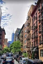 Very Nice Renovated 2 bedrooms Apartment In Trendy Soho District Of Manhattan, Features Hardwood Flooring. Open Kitchen With Stainless Appliance. Everything is Close By : Shopping, Coffee Houses, Entertainment, Near By A/C/E Subway Station.