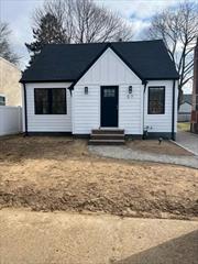 Renovated Cape- Updated Roof, Siding, Windows, Doors, Plumbing, Electric, Spray Foam Insulation all Exterior Walls Including Basement and Roof, Paver Patio, Vinyl Fence, Asphalt Driveway and Much More. Almost Ready For Delivery!