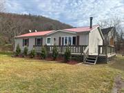 Renovated and bright 3 Bedroom, 2 full bath Ranch in Livingston Manor. Walking distance to shops, restaurants, school, River and a close drive to Roscoe, Jeffersonville and Callicoon. Sun filled open living space with a pellet burning stove. Shed for extra storage, nice leveled yard with newly planted evergreen trees