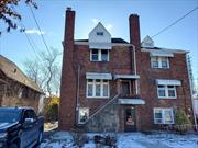 This charming English Tudor home is semi-attached. There are eight or nine rooms, four bedrooms, two full updated baths, a new eat-in-kitchen, living room with fireplace, formal dining room, family room with fireplace, all gas house, one car garage, long and private driveway with room for four or five cars and so much more. Top Lynbrook School district #20 , walk to all public transportation as well as close to the LIRR main line train station. There is lots of shopping close by.