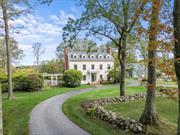 This stately Federal home is the quintessential country estate on 21.72 acres with breathtaking views of Stissing Mountain. Discovered in upstate New York, the house was dismantled and relocated in 1991 to a private setting close to Millbrook. The classic architecture was preserved and includes 9&rsquo; ceilings, detailed moldings, decorative front doorway, wide board floors, and four fireplaces. Providing 4, 414 square feet, the home boasts five bedrooms and four and one half baths. The interior is spacious with a floor plan that lends itself to entertaining and embraces outdoor living. The formal living room and kitchen open to an expansive bluestone terrace with a heated gunite, saline pool. The den accesses the covered porch with mountain views. There is also a detached three car garage with a one bedroom guest apartment above, perfect for overflow of guests or a work from home space/studio. A charming fenced-in garden with raised beds and a small horse facility with paddocks and riding trails adds to this country property. This unique and private home, located behind the Millbrook Vineyards, tastefully combines the best of old world charm and modern comfort.