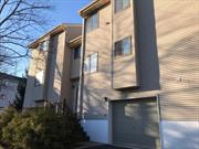 Welcome to The Hamlets in Nanuet! Step into this spacious two-bedroom, townhouse-style condo featuring 2.5 baths and a versatile bonus room. The oversized living room, complete with a cozy fireplace, offers plenty of space to relax. The primary bedroom includes a private bathroom and a walk-in closet for added convenience. The unit is equipped with washer/dryer hookups and offers ample storage. Additional highlights include a one-car garage and two private decks. Enjoy a variety of amenities such as a pool, basketball court, tennis court, and playground. With a nearby bus to NYC and easy access to major highways, shops, restaurants, and transportation, this home is perfectly located for convenience and lifestyle.