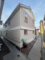 Throgs Neck down the block from Maritime College. Waterview charming detached 1 family duplex with beach access and stunning water views and with 1 parking space. House featuring 3 bedrooms 1.5 bath duplex with open kitchen, living room, large open deck , plenty of windows, hardwood floors and in move in condition. Low annual real estate tax of $3, 200 and conveniently located with local buses in the front, Manhattan Express bus down the block,  and near shopping, schools and highway,