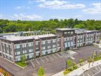 Immediate occupancy available in The Rose at Great Neck. 40-New Luxury Condominiums on the North Shore of Long Island. This brand new mid-rise building is now over 30% sold. Offering an unparalleled residential experience and amenities including virtual doorman services, welcome lobby, resident lounge with YouTube TV, plus gym fitness center with treadmill, bike and free weights. Retreat to the rooftop common area and hang out at the perfect place to unwind with seating and enjoy the outdoors that include distant views towards New York City. Private indoor garage parking and outside private lot parking. The earliest residents have preferred choice of parking spaces. The allure of The Rose extends beyond its walls as residents enjoy instant access to the Village of Great Neck Estates Waterfront Park featuring Olympic sized swimming pool plus small pool, 7 tennis courts plus indoor tennis court in a bubble, marina and dock area, direct waterfront esplanade with views of Little Neck Bay, Douglas Manor and the Throgs Neck Bridge, shoreline access, baseball and soccer fields, playground, basketball, pickle ball, handball courts and snack bar. The Rose was creatively designed by famed architects Mojo Stumer with the very best of quality and modern sophistication. Exterior brick and metal panels accent the solid structure. Three floors high with a mix of 1 bedroom, 2 bedroom and 3 bedroom options in this new building. Unit 302 is two bedrooms and two baths, approximately 1, 172 sqft, private laundry. Big windows in the condo bring in natural light. Sleek modern kitchens to spacious living areas and stunning bathrooms, every aspect of this building reflects a commitment to luxury and comfort. Various golf courses within close proximity and nearby to the famous Americana Manhasset shopping. Just 0.7 miles to the Great Neck LIRR train station that boasts a direct route to Penn Station and now Grand Central Station in Manhattan. Enjoy the suburban lifestyle at the pinnacle of luxury living in Great Neck with all its town amenities just 19 miles to midtown Manhattan and a short jaunt to international airports. Welcome home.