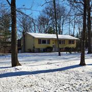 Raised Ranch with one acre on dead end road in the town of Saugerties. 2, 230 finish sf feet,  Three bedrooms, including primary suite, two and half bathrooms, very spacious living room, formal dining room and eat-in-kitchen and family room with fireplace, office/den on lower level plus two car garage. One garage has an enclosed room and was used as workshop area but walls can be removed so you can have the two full deep garages. Privately situated. Home is a little dated but priced accordingly. Located close to the NYS thruway, shopping, , restaurants and so much more.