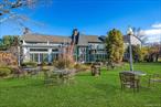 This distinctive property in the heart of Dutchess County combines historic character with over 10, 000 square feet of versatile residential and commercial potential. Originally built in the 19th century as a Congregational church, the building has enjoyed a rich history and now offers endless possibilities for its next chapter. The expansive main level features multiple gathering areas, soaring ceilings, and striking architectural details that create a unique backdrop for a wide range of usesâ€”whether hospitality, creative ventures, or professional space. Complementing the generous interior, outdoor gardens and landscaped grounds provide space for events or a serene setting for relaxation. Above the main level, a private three-bedroom apartment offers comfortable living with a deck overlooking the surrounding countryside. This rare combination of historic charm, substantial square footage, and adaptable layout makes the property ideal for a live/work arrangement, an investment opportunity, or a visionary redevelopment. With its rich character and flexible design, it presents a truly exceptional opportunity in one of the Hudson Valleyâ€™s most desirable locations.