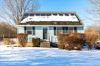 This updated 4-bedroom, 1-bath Cape is nestled just outside the village of Washingtonville, offering a perfect blend of comfort and convenience. Recent updates include a new kitchen floor, new refrigerator, fresh interior paint, and modernized electric. Enjoy the benefits of owned solar panels, a new storm door, energy-efficient ceiling fans throughout and a brand new water filtration system. The home also boasts a newly installed walkway, two new sheds, and a heated garage for year-round use. Relax in the hot tub under the attached gazebo, or stay warm or cool with wall unit air conditioners (split system) through out the home. Conveniently located near the Salisbury Mills train station, local shops, and restaurants, this home is an ideal blend of suburban charm and accessibility. Septic pumped and new well pump installed 4/14/25