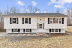 Welcome to this beautiful 3-bedroom, 2-bathroom home located at 41 Martin Rd in Hopewell Junction. With 1, 688 sq. ft. of living space, this charming property sits on a 1.3-acre lot in the highly regarded Arlington School District. The home has undergone a series of thoughtful updates, including a brand-new roof and a freshly paved driveway that leads to a spacious 2-car garage. Inside, you&rsquo;ll find stunning refinished hardwood floors throughout the home, which complement the freshly remodeled bathrooms and the newly updated kitchen. Additionally, the home features a brand-new boiler, ensuring year-round comfort. The expansive lot provides ample space for outdoor activities, gardening, or potential future expansion. This home combines modern updates with the tranquility of suburban living, offering the perfect setting for your next move. Conveniently located near local amenities and commuter routes, it offers both comfort and style in one wonderful package.