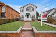 Prime Detached Two Family Home in Bayside. The First Floor Offers a Living Room with Oak Floors, a Dining Area, Kitchen with Granite Countertops, Two Bedrooms, and an Updated Bathroom. The Main Level Also Features a Platform Deck in the Rear, and Three Separate Entrances Throughout. The Second Floor Features a Living Room with a Skylight, a Newly Renovated Kitchen with Stainless Steel Appliances, Center Island with Granite Countertops, and an Abundance of Sunlight with an Additional Skylight. The Second Floor Also Includes Two Bedrooms, a Full Bathroom, and Laundry for Your Convenience. The Full, Finished Basement Offers Two Large Rooms, Plus a Boiler Room. Gas Heating System with Two Boilers and Two Hot Water Tanks, Upgraded Electric, and a One Car Garage. Conveniently Located Near Schools, Shops, Parks, and Transportation.