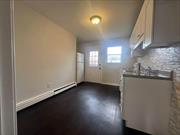 Beautiful renovated kitchen,  1 bedroom, 1 bath, living room, EIK. Apartment on 1st floor of hi-ranch, utilities included. Parking in driveway and street. Wonderful natural light. Interior square footage is approximate.