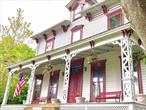 Unique Professional Office Suite in Historic Landmark Building. Located in the heart of Oyster Bay, this professional office suite is situated within a charming historical building recognized by the Historical Society for its prominent architectural features. Highlights include floor-to-ceiling windows, ornate exterior brackets, interior crown moldings, and 9-foot ceilings. The suite is on the second floor and offers access to a shared common area and restroom. All utilities are includedâ€”heat, central air, and Wi-Fiâ€”for hassle-free occupancy. Conveniently located near the train station, local park, beaches, shops, and restaurants, this space combines modern amenities with the timeless charm of a historic setting. Enjoy the perks of being part of a beautiful, established office building in a prime location.