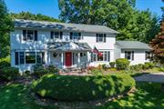 Welcome to this timeless Center Hall Colonial, situated on a serene tree-lined cul-de-sac. This exquisite home boasts oversized entertaining spaces, seamlessly blending classic charm with modern updates. The main level greets you with a bright and inviting living room, a formal dining room perfect for hosting, and a sunlit sunroom with radiant heat is ideal for relaxation. The spacious family room, complete with a cozy wood-burning fireplace, flows effortlessly into the oversized chefâ€™s eat-in kitchen, outfitted with stainless steel appliances and abundant storage. A convenient mudroom, laundry room, and a full bath with radiant heat flooring add practicality and comfort to the first floor. Upstairs, the luxurious primary suite offers a walk-in closet and a spa-like full bath, providing the perfect retreat. Three additional generously sized bedrooms share a well-appointed full bath, completing the second level. Updates include Anderson windows, Hardi plank siding, roof, and central air conditioning, ensuring peace of mind and modern efficiency. Set on just shy of 2 flat acres, the professionally landscaped grounds feature an in-ground saltwater pool, creating a private oasis for outdoor enjoyment. Conveniently located close to train stations, major parkways, and the vibrant villages of Cold Spring Harbor and Huntington, this home offers the best of suburban living. Optional access to Eagle Dock & Beach (fee required) enhances the lifestyle appeal. Incredible opportunity in a perfect location!