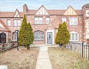 Welcome to this fully attached Colonial Tutor in the middle of 222nd St., in the heart of desired Cambria Heights. Step into the inviting living room featuring the classic ceiling beams and a cozy wood-burning fireplace. Enjoy formal dining in a dedicated space and prepare meals in a galley-style eat-in kitchen which opens to a balcony ideal for morning coffee or evening relaxation. With three spacious bedrooms and two full baths, there is plenty of room for everyone. The full basement includes an outside entrance, providing additional convenience and potential. Hardwood floors run throughout the home. This gem is just waiting for your personal touch to revitalize its charm, making it the perfect haven for family unity and love,  just as it has been for the past 60 years. Donâ€™t miss this opportunity to make this your home!