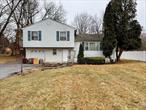 Discover the potential in this 3-bedroom, 1.5-bathroom split-level home, perfectly situated in a peaceful neighborhood within the Wappingers School District. The spacious layout offers versatility, featuring a ground-level family room, a second level with a kitchen, dining area, living room, and fireplace, and a third level with generously sized bedrooms and a full bathroom. The partially fenced, larger backyard is a standout feature, complete with a shed for additional storage and plenty of space for outdoor activities. The basement provides additional potential with laundry hookups and room for your creative vision. With updates, this home is ready to shine under new ownership, presenting a fantastic opportunity to add value and make it your own. Conveniently located near parks, shopping, transportation, and more, this home offers both comfort and accessibility. Donâ€™t miss out on this chance to create your dream home in an excellent location!