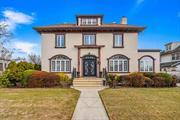 Luxury and elegance define this center hall colonial in Hollis Park Gardens, fully renovated just about 7 years ago, offering 7 bedrooms, 3.5 bathrooms, and a wealth of high-end details, this home boasts a grand entry foyer with marble floors, a spacious living room with a fireplace, a formal dining room, and a modern eat-in kitchen with granite countertops, marble floors, and stainless steel appliances. Brazilian cherry wood floors and stairs, crown molding throughout, add a touch of elegance. A large master suite with a private bathroom elevates the living experience. The common bathroom includes both a whirlpool tub and a standing shower. A fully finished basement with an entrance offers three, rooms, a bathroom, utility rooms, and a laundry area. Enjoy the comfort of central heating and air conditioning, a 75 x 100 lot with a private driveway, a 2-car detached garage, and a back deck with an awning. Conveniently located near public transportation and all other community amenities.