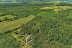 Build your dream home or peaceful retreat on this secluded 6.59-acre lot, set 1, 000 feet off the road for unmatched privacy. Enjoy scenic views, gently rolling hills, and the quiet charm of country livingâ€”all just minutes from downtown Hudson Falls. A rare opportunity to create your own private escape!