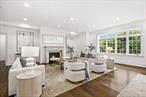 Enjoy luxury living in this gorgeous three-bed, three-and-a-half bath Condo in Scarsdaleâ€™s premier building. With over 3000 square feet, this home boasts an open floor plan with high-end finishes. The foyer leads to the custom kitchen, with Thermador appliances and large island, living room with gas fireplace, and dining room. The primary suite features a spa-like bath with free standing tub, huge WICs by California Closets and French doors to the private terrace. A 2nd oversized bedroom includes an en-suite bath. A 3rd bedroom with en-suite bath, powder room and laundry room complete this stunning unit. Additional features include hardwood floors, pre-wiring for in-wall speakers, two assigned indoor parking spaces, and a storage room. The building offers amenities such as a fitness center, EV car charging, and doorman. Located at Five Corners, The Heathcote combines boutique luxury with easy access to Scarsdaleâ€™s best shopping and dining. Photos are of model unit.