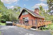 A-Frame home in the town of Wallkill within the Minisink School District. The home is nestled amidst 1.2 acres of serene woodland and offers lots of natural lighting, vaulted ceilings, along with charm and privacy. A large wrap-around deck hugs the perimeter of the home, providing ample space for outdoor relaxation, entertaining, and soaking in the sights and sounds of nature. Inside enjoy the rustic beauty with breathtaking views of the floor-to-ceiling windows. The updated kitchen and bath in 2023 give it a modern touch. Other modern conveniences are smart thermostats and well water filtration system. A three season sun room with floor to ceiling windows adds to the charm of this house along with a bedroom on the main floor. Heading upstairs to the primary bedroom, you&rsquo;ll discover exposed wooden beams providing a comfortable and relaxing space. On the bottom level you will find a living area with an additional fireplace. A bedroom on the lower level, laundry area and walk-out provides a perfect private space. Outside, explore with winding paths leading through the woods and opportunities for outdoor recreation with the above ground pool just steps from your door and a shed that provides your outdoor storage. Potential for purchase of the furniture. In addition, the property is currently being used as a successful AirBnB providing extra income. Schedule your showing today! Additional Information: HeatingFuel:Oil Above Ground,