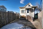 Welcome to this delightful 2-bedroom, 1-bathroom single-family home, perfectly situated off 88th Street in Rockaway Beach. This freshly painted bungalow offers the best of beachside living with its ideal location close to the bay, the beach, the Cross Bay Bridge, shopping, the ferry, and public transportation.Inside, youâ€™ll find a spacious attic perfect for extra storage or a creative retreat, along with tall ceilings in the full basement, adding to the homeâ€™s versatility. The basement also features a convenient laundry room, making everyday living a breeze.Whether youâ€™re a first-time homebuyer or looking to downsize, this property offers endless potential to make it your own. With its prime location and adaptable layout, you can transform this charming bungalow into your dream home. Donâ€™t miss out on this opportunity to embrace the coastal lifestyle in Rockaway Beach!