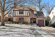 Welcome to this charming Tudor located on a quiet tree-lined street in the heart of Great Neck. Enter into an elegant formal living room with wood burning fireplace and original stained glass windows which add beauty to this home. Formal dining room is cozy and serene, great for entertaining. The den off the kitchen is the perfect place for gathering or just some quiet time. Eat-in kitchen makes cooking a pleasure with it&rsquo;s Thermadore oven, granite countertops and radiant heat flooring throughout. Washer and dryer are secretly tucked away in the kitchen. Powder room also with radiant floor heat has the potential to become a full bath. Up the stairs on the second level is the primary bedroom with en suite bath, 3 additional bedrooms and hall bathroom. Basement has lots of storage and great space. Attached garage and beautiful backyard. Close to town, shopping and Long Island Railroad.