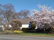 Charming & Classic, updated 1940â€™s era Home. Loads of Original Period Details. The Entry Foyer leads to Formal LR/DR Combination, Eat-In-Kitchen with large, walk-in Pantry; 3 BRs (1 now setup as Den/Office) and 2 Full Baths. There is an enclosed 3-season side porch and back foyer to a PRIVATE and Securely Fenced-in Yard with Garden Shed. Full Basement with Inside Entrance includes Washer, Dryer, Deep Laundry Wash Sink, and Crawl Spaces. Plenty of Storage including numerous Period Appropriate Custom Built-Ins & Customized Closets. PLUS Unfinished Attic with stand-up room & NEW pull-down stairs. Manicured Front Yard with ornamental trees, brick walkway, & classic perennial gardens, all set off by a beautiful driveway updated w/stone pavers and decorative fencing. Light, Bright and Cheery Living! Easy Access to Shops, Schools and Downtown, yet close to Sound, Bay and Ocean Beaches, as well as Vineyards, Breweries, Award-Winning Restaurants, Golf & Local Farm Stands! You Are Home At Last!!