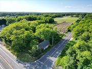 This 6.8 acre property is comprised of two separate build-able parcels. A 2.2 acre residential lot and a 4.6 acre residential building lot. The property is currently a farm and is deer fenced. Conveniently located at the gateway of the east end of Long Island, the sizable parcel is ideal for several uses including a micro-farm or equestrian/agricultural influenced home estate.