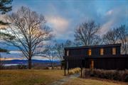 Located less than 5 minutes from the center of Rhinebeck Village find this preserved Mid-Century home perched on 49 acres of land with incredible sunset views over the Hudson River and Catskill Mountains. Built in 1970, the 4 bedroom, 2 and a half bath home has original wood floors throughout and a wood burning fireplace in the living room surrounded by windows and sliding glass doors bathing the home with light and incredible views. The main floor has an office, living room, dining room, kitchen, pantry and half bath. The second floor has a primary suite, 3 additional bedrooms and the second full bath. The two car garage is attached and directly accessible through the kitchen. Extensive site work has been done on the property. The views have been opened up, removing old trees and canopying others. The driveway has been graded and trenched to prevent wash out. Sub-division has been conditionally approved by the Town of Rhinebeck. Less than 2 hours to NYC, easy access to Amtrak and all of the amenities of the Hudson Valley. Additional Information: HeatingFuel:Oil Above Ground, ParkingFeatures:2 Car Attached,