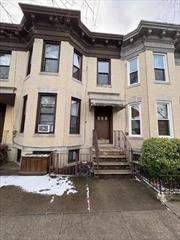 2 family attached brick townhouse. Being sold as is. No representation on heating, plumbing and electric. 1st floor is 2 bedrooms, 1 bath, LR, DR, kitchen. 2nd floor is 3 bedrooms, 1, LR, DR, kitchen.