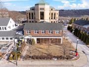 Commercial building for sale in Carmel, NY. Public Sewer and Public Water. 75&rsquo; of road frontage. Approximately 19, 000 cars pass this site a day.  Ideal location in the Hamlet of Carmel. Forget about the advertising budget, this location offers so much exposure! Situated directly across the street from Lake Gleneida, offering beautiful views. Ideal for restaurant, fitness, retail, theater or another commercial business that will serve the ever-growing community. This location was once a Chevy Auto Dealership. Nothing else ever will be on the market like this. TRULY UNIQUE. No parking is available on this property, ONLY street parking. Speak to the Town of Carmel for permitted uses regarding the lack of parking. Current taxes stated are reflected of a government entity. Speak to the Town Assessor on expected taxes based on Buyer&rsquo;s specific use with the property.