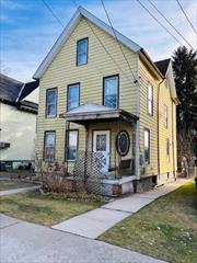 Welcome to this inviting two-story colonial home located on a quiet street just around the corner from Vassar Hospital. Boasting 1, 824 square feet of living space, this home has 4 bedrooms and 1 bathroom. There are hardwood floors throughout adding character to every room. The updated kitchen features modern appliances and ample cabinet space. Step outside to the backyard where a large shed/garage awaits-perfect for storage, a workshop or creative studio. The quiet, one way street, offers peaceful living while still conveniently located near major amenities, schools, parks and public transportation. This home is an estate sale in need of TLC and cosmetic fixes.