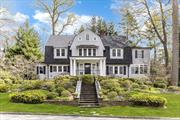 The heartbeat of classic Bronxville, fully elevated for 21st century living. And stunning sunsets are complimentary! Designed in 1910 by premier architect William Bates, this stunning 5 bedroom center hall Dutch colonial underwent a massive 3 story renovation and expansion in 2015-2016 which yielded modern and elegant living spaces both inside and out. The dramatic vibe of the oversized front foyer with its stunning ceiling height and custom built staircase sets the stage for a stylish living room with gas fireplace. Beyond the LR, an expanded sunroom has French doors leading to a new oversized bluestone patio which overlooks the professionally designed flat play yard. Best of all, the state of the art cooks kitchen with its 9 ft long island is complemented by an expanded sitting area adjoining the mother of all mudrooms and a brilliantly designed custom built dog room with Dutch door. Not to be upstaged, the formal dining room has a wall of windows and features super elegant neutral tone Venetian plaster walls. Upstairs, the owners created a dreamy primary BR with fireplace, walk in closet and expanded Waterworks marble bath with double sinks. There are two other new ensuite BR/baths on the second floor and two BRs/office on the third with a new hall bath, plus a delightful windowed office area with custom built in desk. And the lower level is a game changer: Expanded and reimagined with custom cabinetry, LED lighting, new egress windows and a modern interactive art installation, the family room, gym and full bath offer 1500 sq ft of legal living space for work or play. All this plus an easy downhill walk to Bronxville School and village.