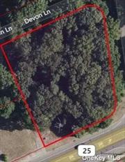 Property has 3 fronts - Middle Country Rd, Wellington Rd & Devon Ln. Split zoning - A1 & J2