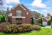 SEARINGTOWN. This stunning custom-built Brick Colonial is nestled in the heart of Searingtown, offering privacy on over half an acre of meticulously landscaped grounds. With a modern and sleek, clean design throughout the home, it features 3 bedrooms, and 3 full and 2 half baths. The open, flowing layout is bathed in natural light from skylights, creating a warm and inviting atmosphere. The living room, centered around a fireplace and accented by a stylish tiled wall, seamlessly connects to the family room, dining room, and provides easy access to the back patio. The well-appointed kitchen, mudroom with laundry, powder room, and an office space complete the main level. A first-floor bedroom with a full bath offers added convenience. The luxurious primary suite on the second floor is a true retreat, designed like a personal spa with custom built-in shelving and a spa-like bath featuring a double vanity, a shower, and a jacuzzi. An additional bedroom and full bath are also located on this level. The outside holds your own private oasis, featuring an in-ground pool and spa, multiple levels of patios, and a built-in BBQâ€”perfect for entertaining on a grand scale. *Whole house generator*