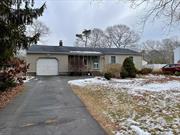 Discover the potential of this 3-bedroom, 1-bathroom home located in the heart of Shirley, NY. Offering a spacious kitchen with propane cooking, living room, and dining room with a breezeway leading to the backyard, this property provides a solid foundation for your vision. Central Air System.The home also features a full unfinished basement with walk-out access, and a 1-car garage, sitting on a level quarter-acre lot. Conveniently located in the William Floyd School District, itâ€™s close to parkways, shopping, and the train station, making commuting and errands a breeze.