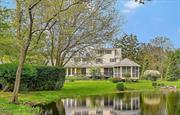 Cutchogue-New Suffolk area- Exceptional setting for this gracious 2+ bedroom,  2 full bath home. 1+ acre private property with a pond and specimen plantings. A gardener&rsquo;s paradise with flowers and shrubs blooming through the seasons. Charming, screened gazebo is perfect for summer shade and outdoor dining, sited with pond and golf course views. First floor: Living room with hardwood floors and fireplace. Dining room with access to the rear deck. Kitchen with stainless appliances and large breakfast nook. Wolf range and hood, tumbled tile backsplash that continues over all counters, granite countertops, and radiant heat. Great room with vaulted ceiling and sliders to the rear deck. Potential for 3rd bedroom. Fabulous views from the house and deck of the pond and rear of the property. All rooms are bright, and light filled. Second floor: 2 large bedrooms, full bath, and office area. The large, beautifully landscaped rear yard is your own natural bird sanctuary. Plenty of room to explore, enjoy tranquility, and for outdoor activities. A restored outbuilding that was moved from its original Mattituck/Laurel site at Camp Immaculata perfect for an office, studio, or gardener&rsquo;s shed, completes this unique offering. Unspoiled, beautifully maintained, and one of a kind. Make it yours. Easy access to Cutchogue beaches, golf, boating, wineries, and restaurants.