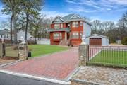 Experience luxury living with this oversized on a flat builder&rsquo;s acre in Selden, NY nestled on a tranquil, secure two-way dead-end street. The home boasts a grand 100-foot-wide frontage secured by brick pillars connected with stainless steel fencing, complemented by lighting throughout and underground cables. The entrance features dusk-to-dawn lighting, ensuring a welcoming ambiance day and night. Outside, a sprawling 7500-square-foot driveway paved with Cambridge bricks provide parking for approximately 10-15 cars. The recently renovated 2-car garage includes a new automatic door, operable via mobile phone, and hosts 2 EV car charging hookups, ready for your installation. The main entry stoop has been converted to concrete and stone. New sliding doors on the first floor and lower level lead to a generous patio area, perfect for outdoor dining and entertaining. Updated windows, chimney (2021), and leaf guards (2022). Roof (2014). 10-zone sprinkler system.