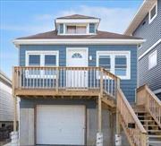 Beautifully Renovated Whole House Rental - Living Room, Spacious Kitchen with All New Appliances, 3 Bedrooms, Tiled Full Bathroom, Primary Bedroom With Ensuite Half Bath and Sliding Doors to Backyard, Front & Back Deck, Near Transportation, Stores, LIRR, and Beach!!!Programs Welcome!