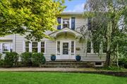 Located on a beautiful street on the edge of the Scarsdale border, & decorated by towering pines, this center hall colonial is the epitome of charm. Hardwood floors greet the eye both upstairs and down. The living room boasts a brick fireplace and French doors that open to a sunporch reimagined as a playroom/office. A bright & airy dining room enjoys French doors to a private side porch, and an updated kitchen showcases white cabinetry, stainless-steel appliances, and a lengthy breakfast bar. A tidy powder room adds to the main-floor appeal. Upstairs, a pair of sizable bedrooms link to a modern bath while two additional bedrooms share a renovated hall bath. The basement level offers laundry, multi-function space, and storage. A level, fenced backyard & paved patio extends to a detached garage. 1 Mile to Metro North(White Plains & Hartsdale). Central A/C & heating (electric heat pumps)insulation in all exterior walls and basement rim joists. Parking Features: 2 Car Attached.