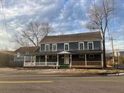 MULTI-FAMILY DWELLING in Pine Bush awaits the perfect buyer who can bring it back to life. This oversized 1.1 acre lot includes two separate buildings both with great potential for an investor to rent out all 4 units or for an owner occupied who is looking to run their commercial business out of their home and rent out the remaining units. The main building features a Commercial space which was once a Bar/Tavern with a restaurant. Approximately 1650 sq ft that features a commercial kitchen, bar, and dinning area along with a private event room and 2 bathrooms. The upper level offers another 1650 sq ft with 2 residential units one being a 1 bedroom & a 2 bedroom apartment both with an eat-in kitchen and a private bath. A spacious walk-up attic with plenty of storage space. The second building offers storage space in the 1st level that can easily be leased to the commercial tenant for Additional storage space or home office. The upper level offers another a 1 bedroom apartment with a kitchen, living room and private bath. The outdoors offers ample parking in the front and additional parking behind. The space in the back has potential for outdoor seating as the lot behind the fence area is ALSO included! 15 min ride to Middletown and major highways. Bring your hammer and imagination as once fully remodeled there can be 5 possible sources of income generating units!! Book your tour today!