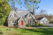 CHARMING UNIQUE FARMHOUSE GETAWAY!! Welcome home to this custom-built cape-cod style retreat located just over an hour north of NYC. Wrapped in cobble stones taken from an expiring New York City road in the early 1900&rsquo;s and sitting on just under an acre with the perfect amount of manicured landscaping and wooded surroundings this home has it all. Enjoy the warmth of the wood fire and the comfort of the historic hardwood floors and wood trim throughout. The kitchen features stainless appliances, granite countertops and a sun drenched dining room with custom corner built in shelving and views of the lake. The first floor features two spacious bedrooms, on the way up to the second floor you are welcomed with two beautiful bedrooms with vaulted ceilings, plenty of light and a country view all around. Close proximity to hiking trails, kayaking and all the Hudson Valley has to offer. Schedule your private tour today!