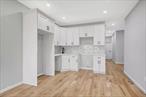Situated on a beautiful tree lined street of Richmond Hill, 126-08 95th Avenue is a newly renovated, turn key move in ready two family which provides the perfect opportunity for buyers looking for space, plus income generating rental property to assist with mortgage payments. This 20x55 townhouse spans over 3, 300 sq/ft of living space!Configured as 3 bedroom 2 bath rental unit which has the ability to generate $3, 600/month to assist with mortgage payments. The Garden unit consist of 3 bedrooms and has access to the rear yard. The basement has separate entrance and has 2 additional bedrooms, a full bath and a summer kitchen. Both units enjoy expansive sun drenched living/dining areas which provide great space for entertaining. Beautiful chefs granite kitchens equipped with floor to ceiling custom cabinetry and adorned with a full fleet of stainless steel appliances. Spacious bedrooms equipped with ample closet space. Fully tiled bathrooms adorned with state of the art wall & floor tiles. Renovations include brand new hardwood flooring, recessed lighting, updated electrical, heating and plumbing systems throughout. 126-08-95th Avenue is conveniently located with close proximity to major transportation which makes commuting a breeze. Just off Atlantic Avenue, Van Wyck Expressway, 101 Avenue and Liberty Avenue. Short blocks to LIRR Jamaica Station, E & F Subway lines.