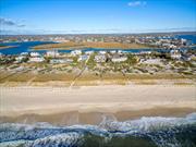 Turnkey Oceanfront Home, Between the Bridges in Westhampton Beach -  This custom-built home occupies a commanding location: perched on 1.2 acres, in the prestigious between-the-bridges area - with 173 feet of ocean frontage at the end of a deep, protective dune. Designed with meticulous attention to detail & quality, and built by a renowned local expert, it offers a private and airy environment, with gracious, open living spaces, a gourmet kitchen, six ensuite bedrooms - including an ADA-compliant bedroom on the first floor - an elevator, a comprehensive water-filtration system, multiple decks, heated garage, a large, oceanside pool with spa, and a private, deeded right-of-way, with floating dock, directly across the street.