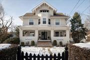 BROADWAY BEAUTY - Step into a world of timeless elegance with this meticulously restored circa 1902 Arts & Crafts Colonial, located on one of Nyack&rsquo;s most coveted streets at 198 North Broadway, Nyack, NY. This extraordinary residence combines historic charm with modern comforts, offering over 4, 000 square feet of living space, including a finished basement. Nestled on a half-acre of level, manicured grounds, this home is a sanctuary of character and craftsmanship, just 35 minutes from NYC and moments from the Hudson River and Nyackâ€™s vibrant downtown. As you approach the property, the expansive rocking-chair front porch invites you to savor serene mornings with coffee or lazy afternoons, basking in the quiet beauty of this iconic riverfront village. The grounds themselves are a gardener&rsquo;s dream, featuring a striking bluestone patio, multiple seating areas, and lush landscaping that creates a magical setting for al fresco dining and year-round enjoyment. Inside this masterpiece, the home unfolds with impeccable attention to detail. The grand entry foyer sets the tone with its warm and inviting ambiance, leading to a formal living room adorned with coffered ceilings and stained glass windows. Adjacent, a stunning library showcases breathtaking custom millwork, original pocket doors, and built-in wood panels, providing a perfect space for reading, reflection, or intimate gatherings. The formal dining room exudes charm with its built-in cabinetry and cozy wood-burning fireplace, ideal for hosting special occasions. The updated chef&rsquo;s kitchen is both functional and delightful, boasting a breakfast nook with a built-in bench, two pantries, a Sub-Zero refrigerator, and ample counter space to inspire culinary creativity. The upper levels of the home offer versatile and luxurious living with spacious accommodations and river views. The top two floors offer four bedrooms, three full baths, and a sunlit home office overlooking North Broadway and the majestic river. The primary suite is a retreat unto itself, complete with a dressing room, walk-in closet, and a spa-like en suite bathroom featuring a Jacuzzi tub and separate shower. A third-floor suite offers a unique haven with its full bath, expansive space and private outdoor porch, perfect for use as an additional bedroom, guest quarters, or a second home office, all while capturing breathtaking views of the Hudson River. The finished basement provides a generous family room/bonus space, a full-sized laundry room, and an additional bath. A two-car detached garage and parking for six cars ensure ample space for residents and guests. This home is the epitome of modern comfort in a timeless setting with conveniences including central air conditioning and a whole-house generator, seamlessly blending with the homeâ€™s historic charm. This gracious turn-of-the-century classic offers not just a home, but a lifestyle, where every detail has been thoughtfully curated. From the enchanting grounds to the exquisite interior detail, this property is a quintessential Nyack treasure. Discover the perfect blend of historic allure and contemporary luxury in a location that offers the best of village living, just a stone&rsquo;s throw from the Hudson River.