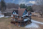 Introducing Alwynds - a quintessential 1911 Craftsman-style residence, proudly situated in the center of Pine Plains in the enchanting Hudson Valley region of NYS. This impressive home has been lovingly maintained by its owners for over four decades, a testament to its enduring appeal and solid construction. Alwynds exudes classic Craftsman charm, with its distinctive combination of stone and stucco facade and elegantly adorned with Boston ivy, creating a picturesque setting that captures the imagination. Step inside to discover a treasure trove of original features including oak flooring, a magnificent stone fireplace, and rich chestnut trim that frames each room with warmth and character. The kitchen features beautiful custom cabinets and high-end appliances. The formal dining room, with its refined ambiance, is perfect for hosting memorable gatherings, while the cozy and well-appointed living spaces invite relaxation and everyday enjoyment. Upstairs, three bedrooms offer peaceful retreats, each infused with the home&rsquo;s inherent charm. A large attic presents endless possibilities for creative use or storage. Outside, the property&rsquo;s grandeur continues with a two-story barn/garage that echoes the home&rsquo;s craftsmanship, providing ample space for vehicles, hobbies, or additional storage. The balance of the 1.2 acres includes a garden shed, beautiful gardens, and a thriving orchard, offering a pastoral escape and the potential for garden parties and outdoor activities. Alwynds is more than a home; it&rsquo;s a legacy awaiting its next chapter in the heart of Pine Plains, where community life and natural splendor converge. Walk to shops, restaurants (Stissing House colonial tavern) and food stores. Enjoy the many area attractions including art and cultural venues, lakes and ponds, wineries and so much more. Only 2 hours to NYC.