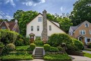 Sun drenched 3 bedroom Colonial with mature plantings and serene backyard nestled in beautiful tree-lined street. Spacious layout with formal dining room, sun room and bonus room in attic. Close distance to bus & Pelham train Station. Finished basement with washer and dryer. A must see!