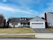 This spacious 3-bedroom, 2.5-bathroom ranch home, nestled in the heart of Cedarhurst on an expansive 80x100 lot, offers a comfortable blend of classic features and modern updates. The bright family room boasts a fireplace, while the oversized formal dining room leads into a beautifully renovated eat-in kitchen with stainless steel appliances, dual sinks, and ample counter space. An oversized living room provides gracious space for entertaining. The master bedroom suite includes its own private full bath, complemented by two additional bedrooms and a second full bathroom plus a powder room. Other features include, Hardwood floors, gas heating, and central air conditioning enhancing the home&rsquo;s appeal, while a two-car garage, in-ground sprinkler system, and an enormous walk-up dormered unfinished attic and basement offer plenty of potential for storage and customization. Conveniently located just minutes from shopping, dining, parks, schools, public transportation, and houses of worship, this home is perfect for both comfort and convenience.